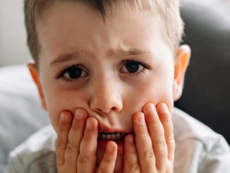 child with toothache