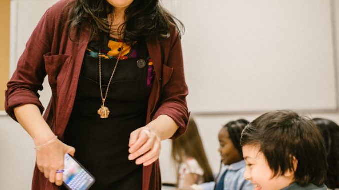 pexels-photo-6936135 teacher scolding her student
